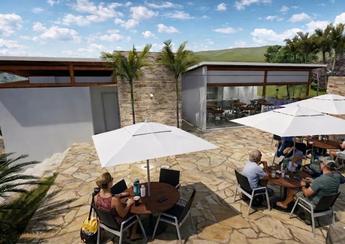 Espaço gourmet externo com ombrelones e mesas em pedra (imagem ilustrativa)
